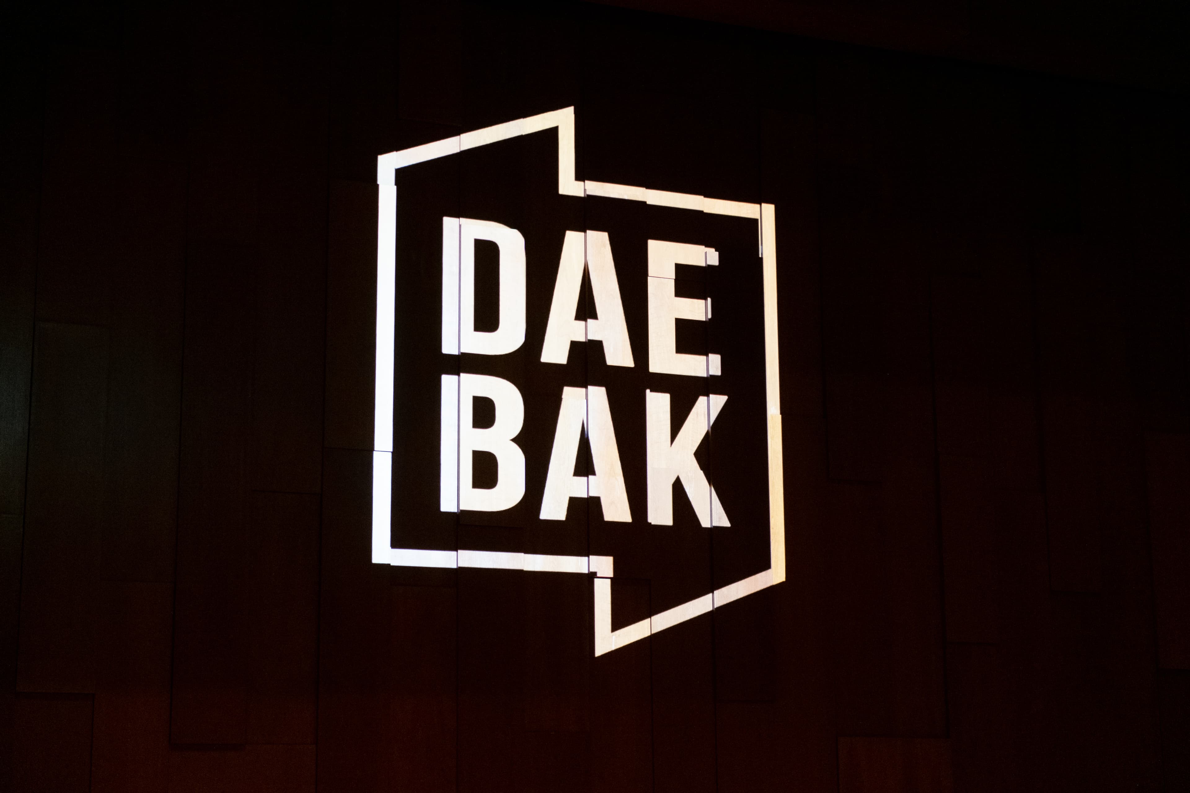 DAEBAK Logo Projection