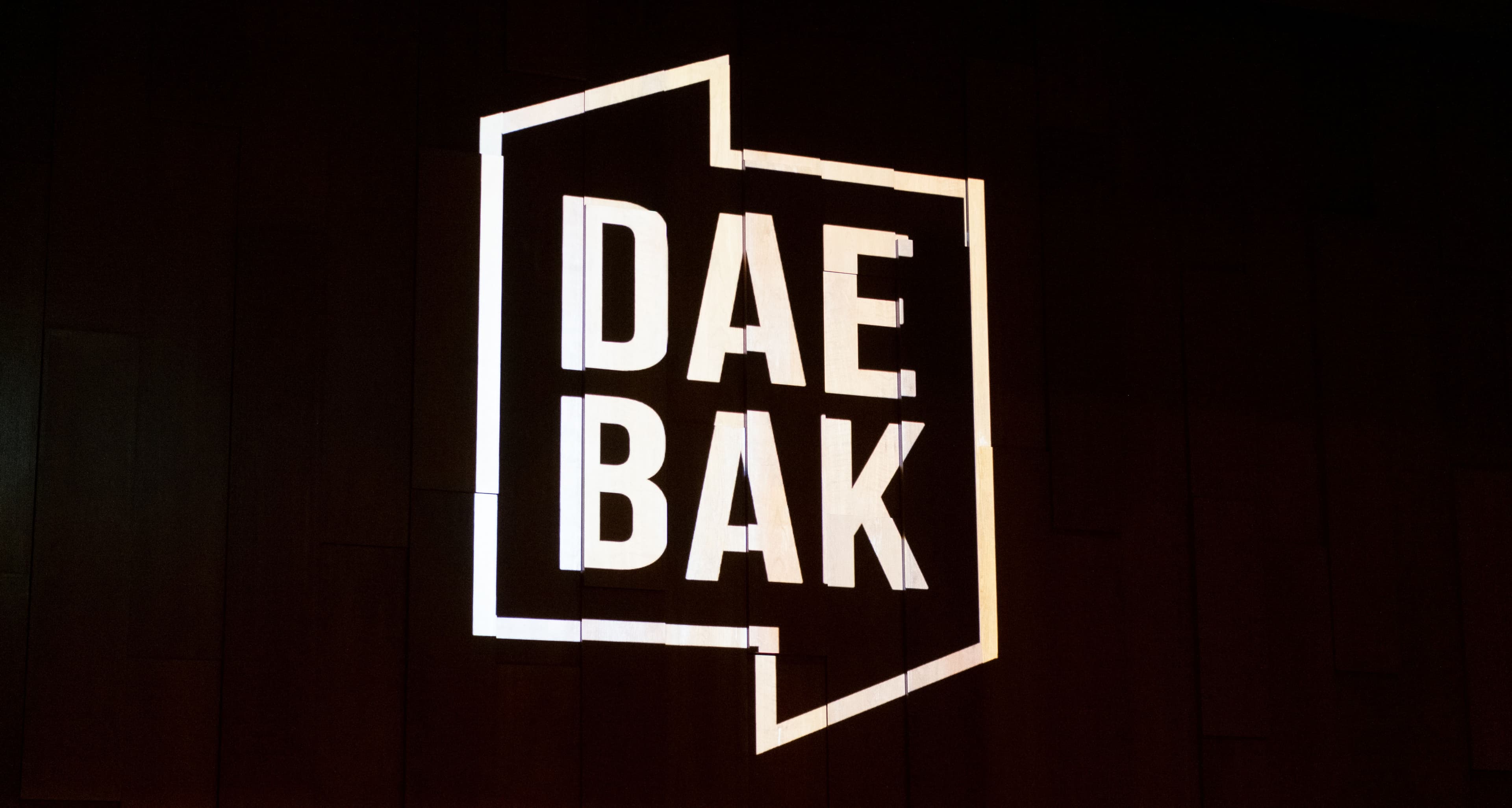 DAEBAK Logo Projection